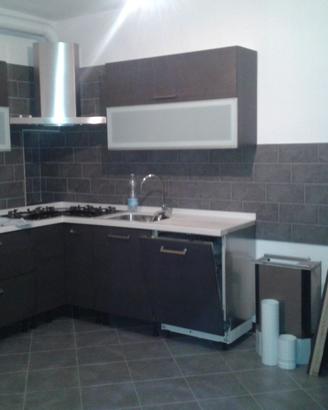 Cucina Angolare COMPREX con piano in CORIAN