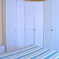 GUARDAROBA CON CABINA ARMADIO ANGOLARE