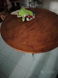 tavolo in legno con struttura in ferro battuto 