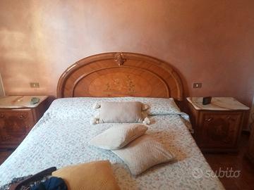 sala con mobile bar camera da letto e cucina 