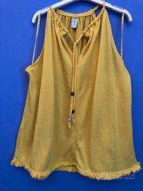 canotta gialla in stile boho con frange