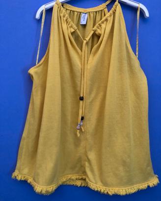 canotta gialla in stile boho con frange