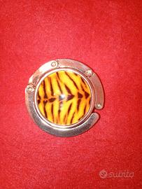 Gancio per appendere la borsa