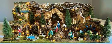 Presepe artigianale con luci e personaggi