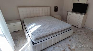 camera da letto colore bianco lucido laccato