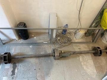 Asse con motore per saracinesca