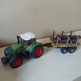 Trattore Bruder con rimorchio legna