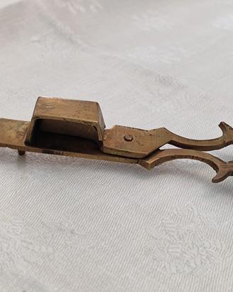 forbici spegni candela 