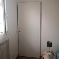 porta bianca NUOVA con binario a scomparsa