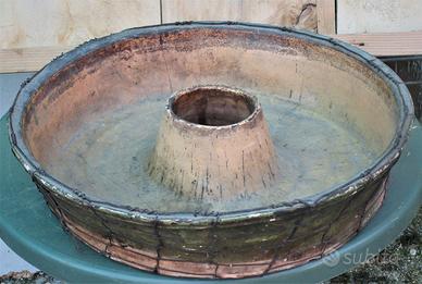 Antico stampo da forno in cotto