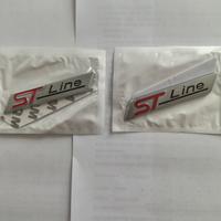 Targhette metalliche adesive ST Line