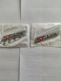 Targhette metalliche adesive ST Line