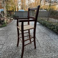 Seggiolone vintage in legno impagliato