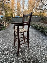 Seggiolone vintage in legno impagliato