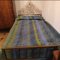 Letto singolo in ferro battuto