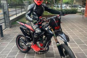 Tuta moto in pelle 2 pezzi usata colore grigio