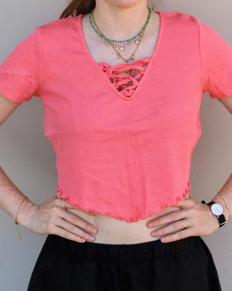 Crop top corallo a coste con scollo intrecciato