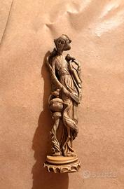 statua
