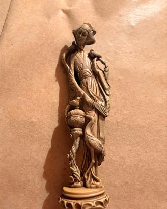 statua