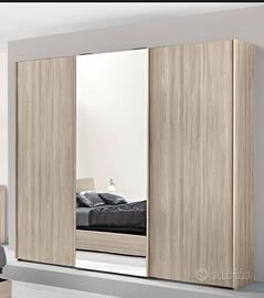 Armadio 3 ante scorrevoli.