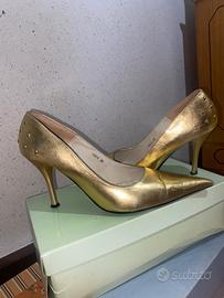 Tacchi oro a spillo