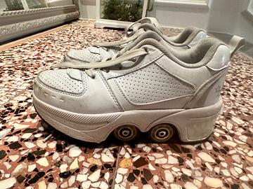 Scarpe con ruotate estraibili