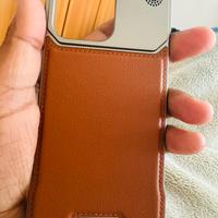 Cover iphone 15 pro max in metallo e pelle