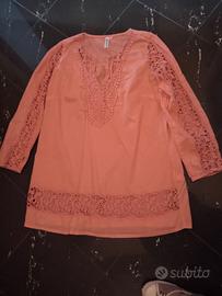 Blusa arancio con inserti