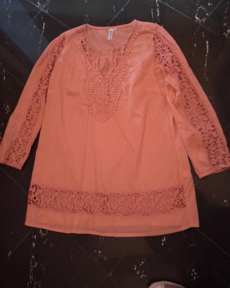 Blusa arancio con inserti