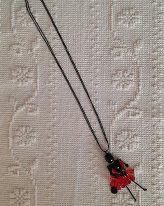 Collana lunga con bambolina
