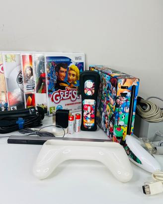 Nintendo Wii con Skin + Controller  +5 giochi