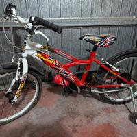 bicicletta bimbo con rotelle quasi mai usata