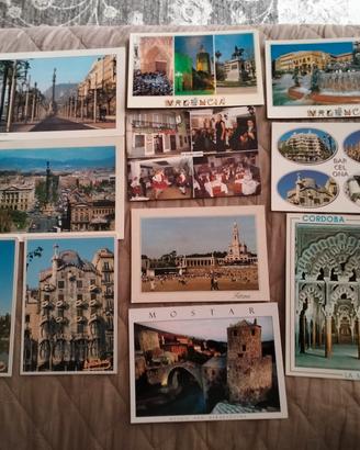 11 cartoline raffiguranti diverse città estere . 