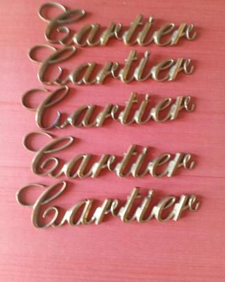 Logo originale Cartier in ottone fuso