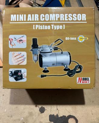 Mini compressore