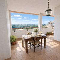 Elegante Appartamento con Terrazza e Garage