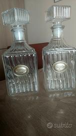 due bottiglie vetro/argento