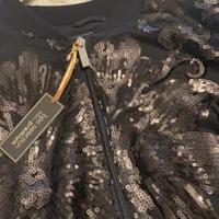 Giacca elegante con pizzo e paillettes