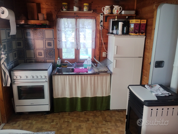 Bungalow con roulotte