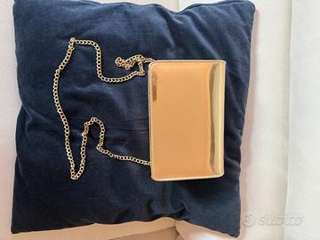 Clutch elegante in laminato oro lucido