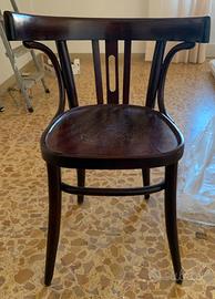 Sedia antica in legno curvato