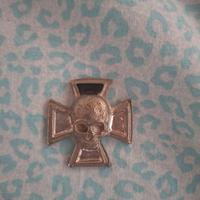 medaglia con teschio 