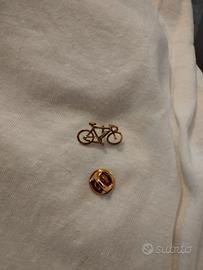 spilla a forma di bicicletta