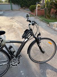 Bicicletta Trekking BTwin Super Accessoriata