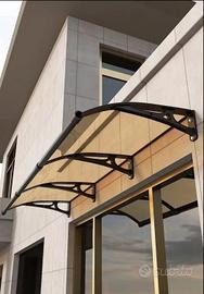 Tettoia in policarbonato e staffe in alluminio 