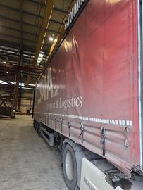 Semirimorchio con buca coils, alza abbassa.