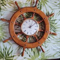 orologio da parete a forma di timone