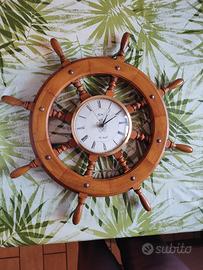 orologio da parete a forma di timone