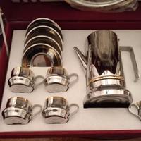 Servizio caffè in acciaio inox 18/X e oro zecchino