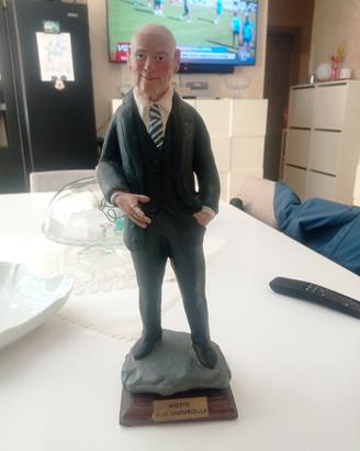 statua 